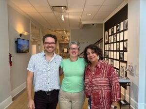 The two Fringe directors, Analia and Charles, pose for a picture with Lisa, Executive Director of Museum of Art Fort Collins.
